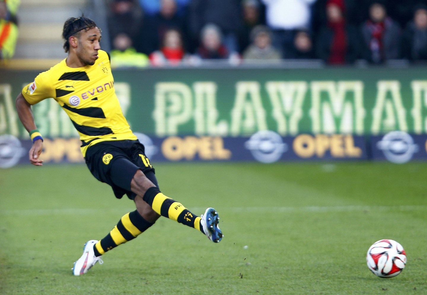 Borussia Dortmund's Aubameyang scores against SC Freiburg in Bundesliga soccer match in Freiburg