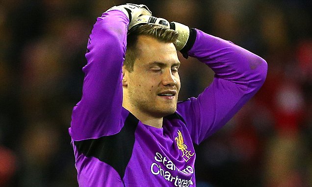 Liverpool goalkeeper Simon Mignolet shows a look of dejection