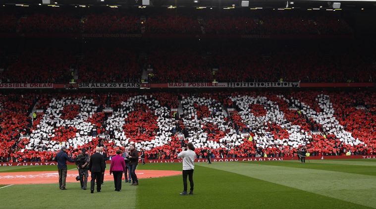 Football Soccer - Manchester United v Everton - Barclays Premier League - Old Trafford - 3/4/16 Sir Bobby Charlton and wife Norma walk out onto the pitch as fans pay tribute during the unveiling of the newly renamed South Stand "Sir Bobby Charlton stand" to commemorate the 60 year anniversary of his debut for Manchester United Action Images via Reuters / Jason Cairnduff Livepic EDITORIAL USE ONLY. No use with unauthorized audio, video, data, fixture lists, club/league logos or "live" services. Online in-match use limited to 45 images, no video emulation. No use in betting, games or single club/league/player publications. Please contact your account representative for further details.